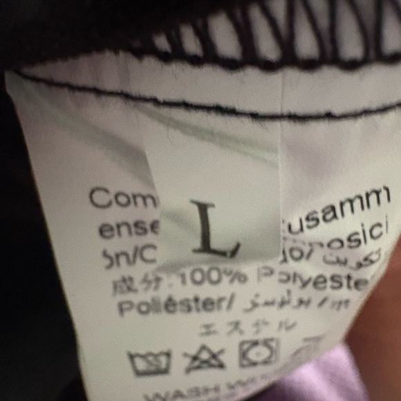 Black and White Track Pants with Modern Athletic Design - Picture 2 of 3